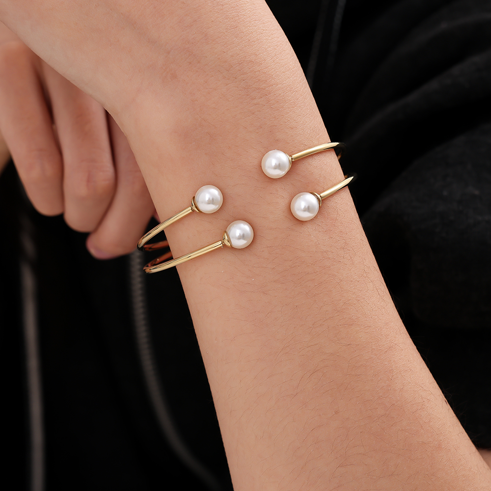 Adjustable Four Pearl stainless steel bangle      
