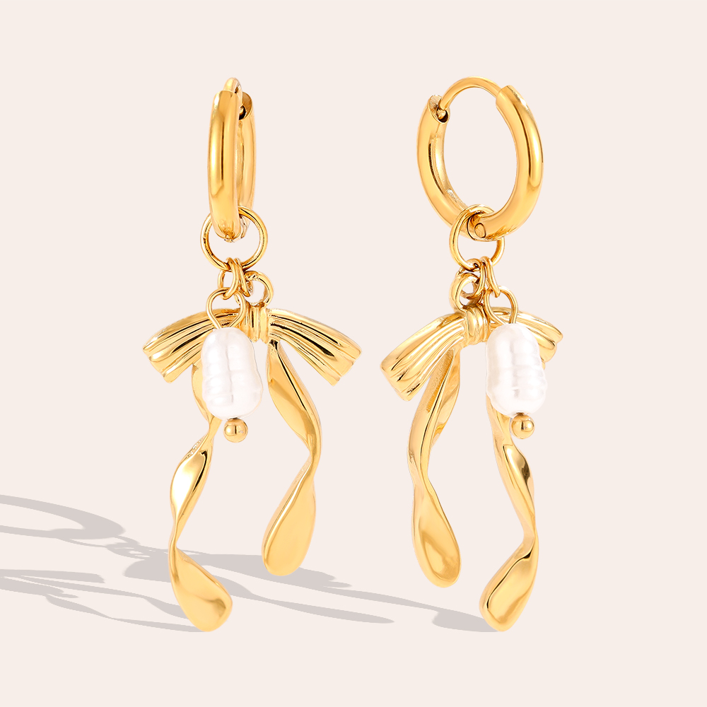 1.2*3.8cm Bowtie And Pearl Stainless Steel Earrings        