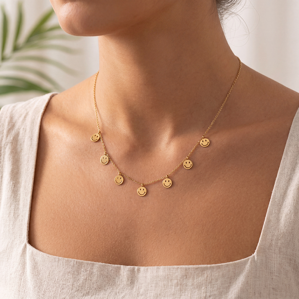Stainless steel necklace, 40cm, with lots of little smiley faces