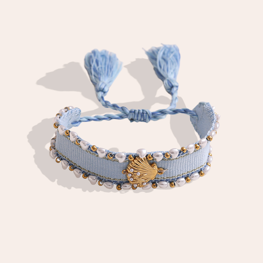 Shell on a polyester bag Stainless steel bracelet