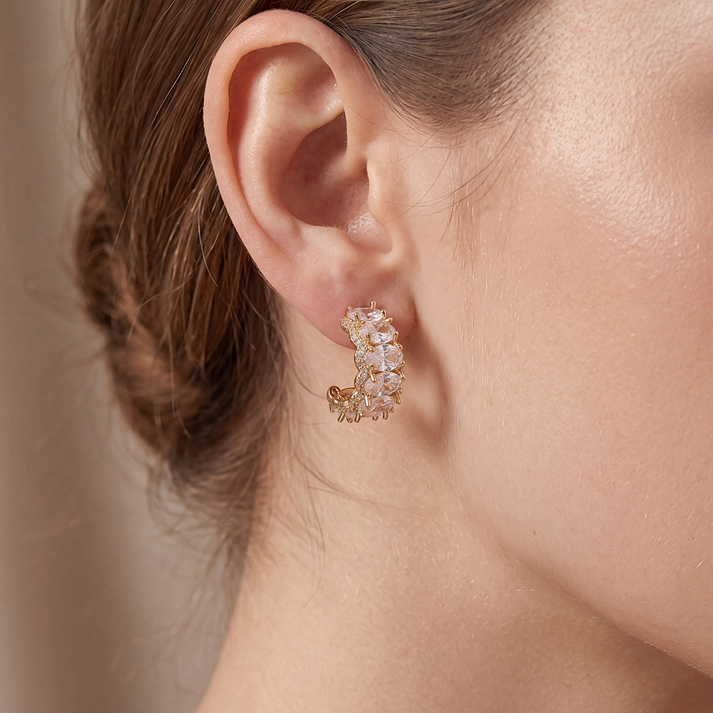 Gold-plated 19mm half-hoop earrings with lots of oval-cut cubic zirconia