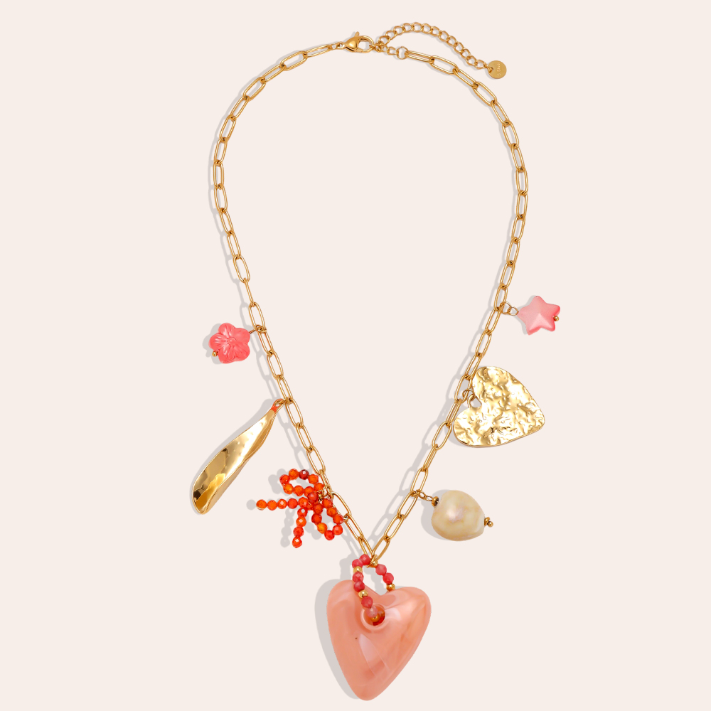 Stainless steel necklace, 40cm, with a pink acrylic heart and decorative elements