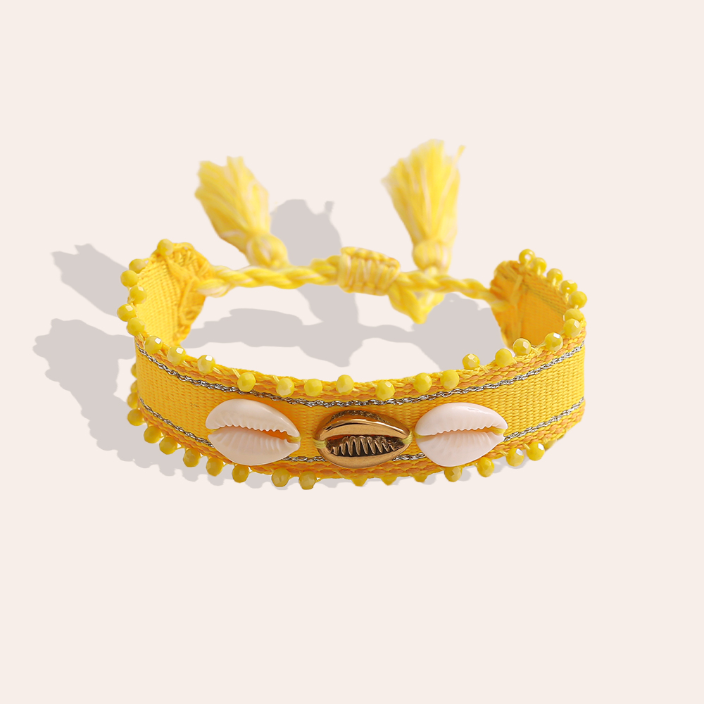 Shell on a polyester bag Stainless steel bracelet