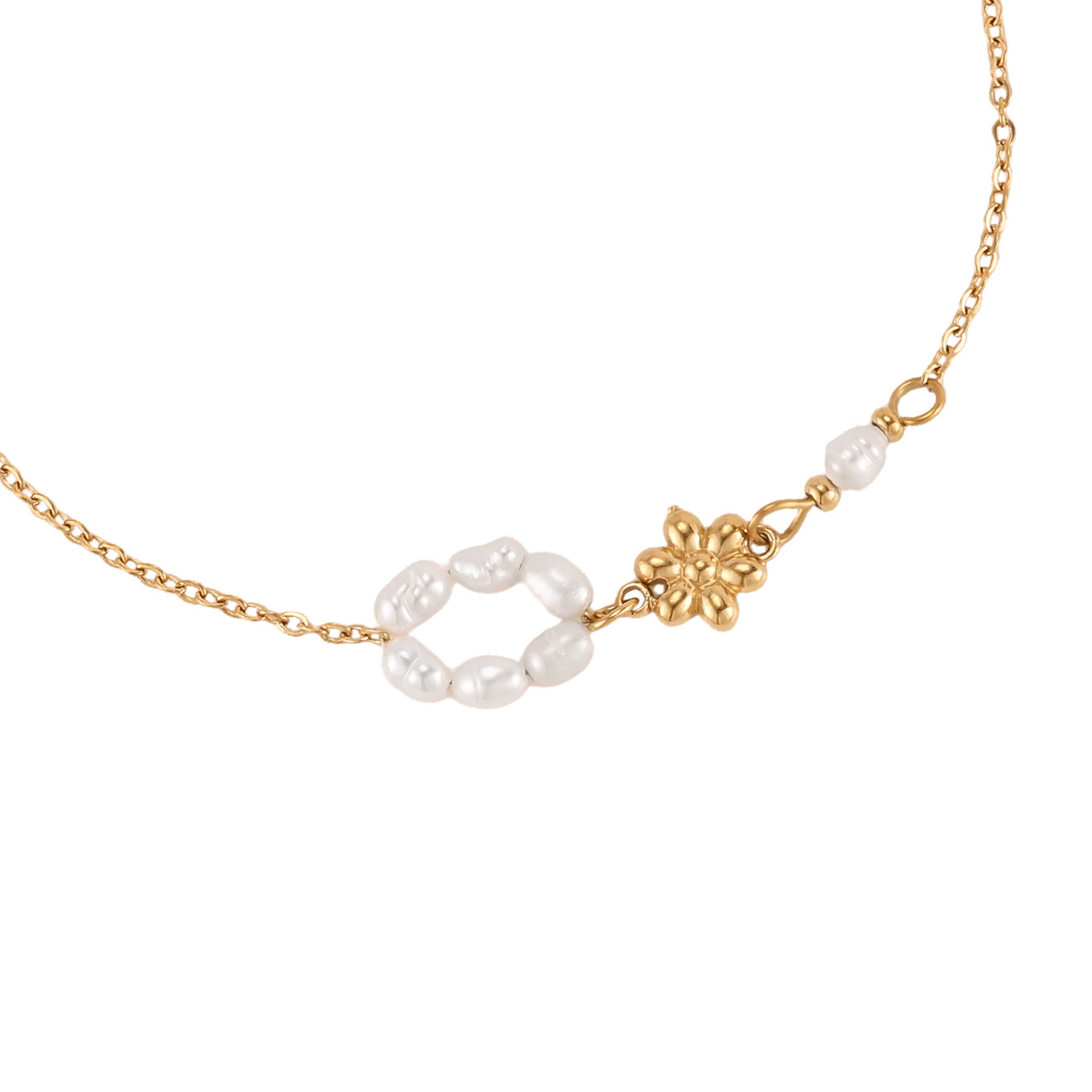 Stainless steel bracelet, 17cm, with a beaded ring and a golden flower