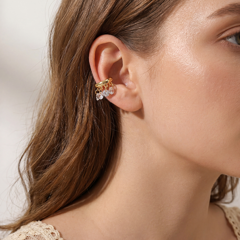 Gold-plated ear cuffs with a 14mm round crystal pendant featuring cubic zirconia 