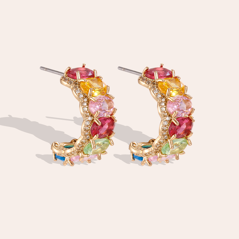 Gold-plated 19mm half-hoop earrings with lots of oval-cut cubic zirconia