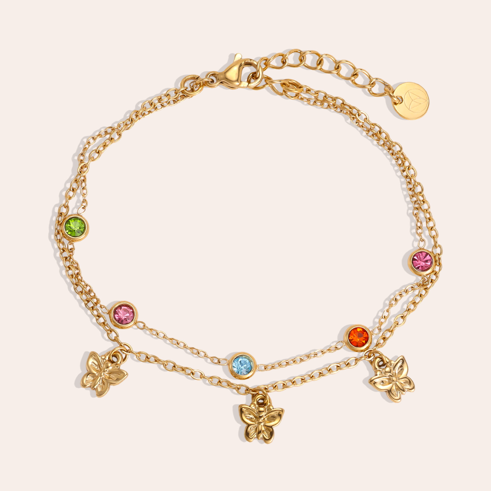 Stainless steel bracelet, 17cm, featuring a butterfly with colourful cubic zirconia