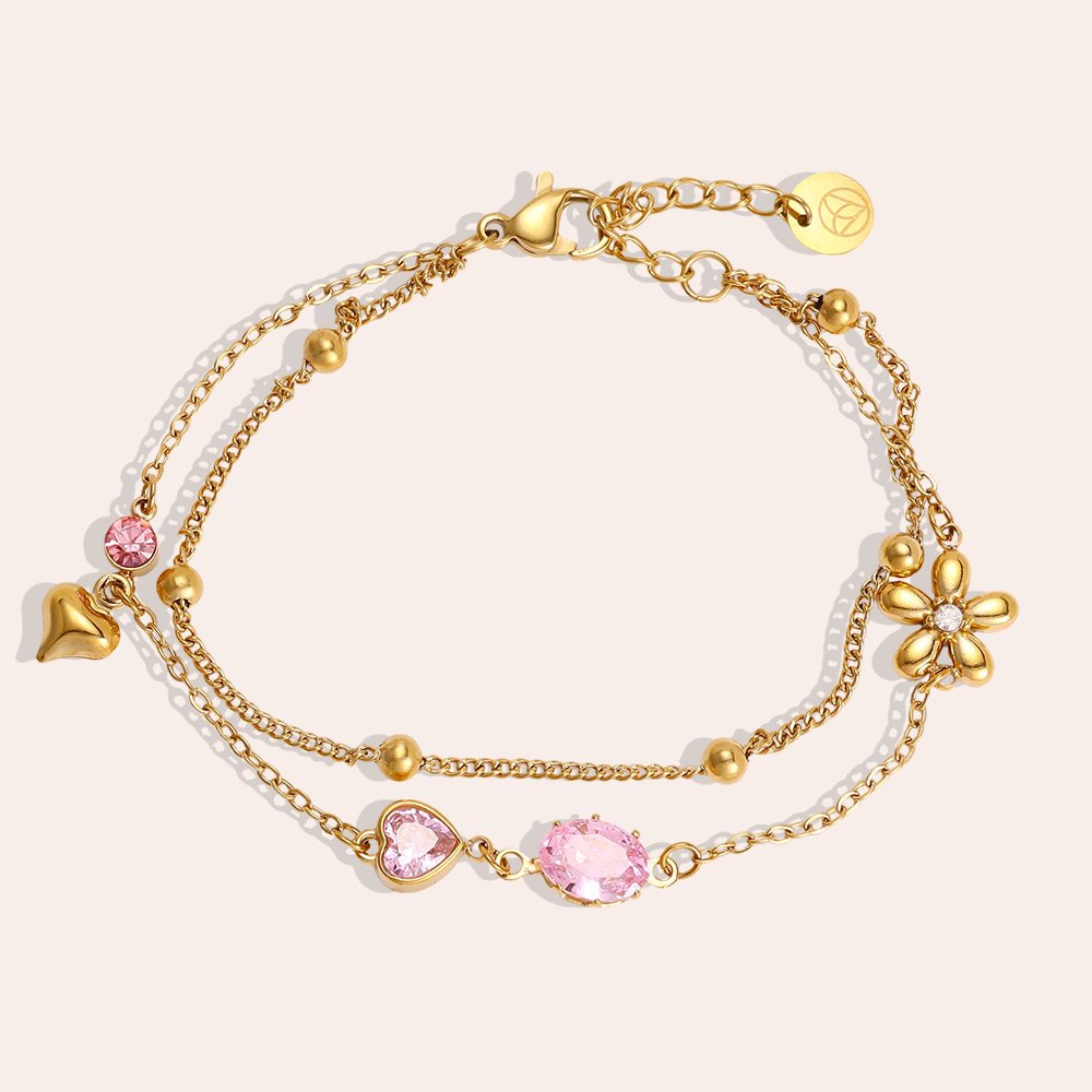 Stainless steel bracelet, 17cm, with pink cubic zirconia and a gold flower