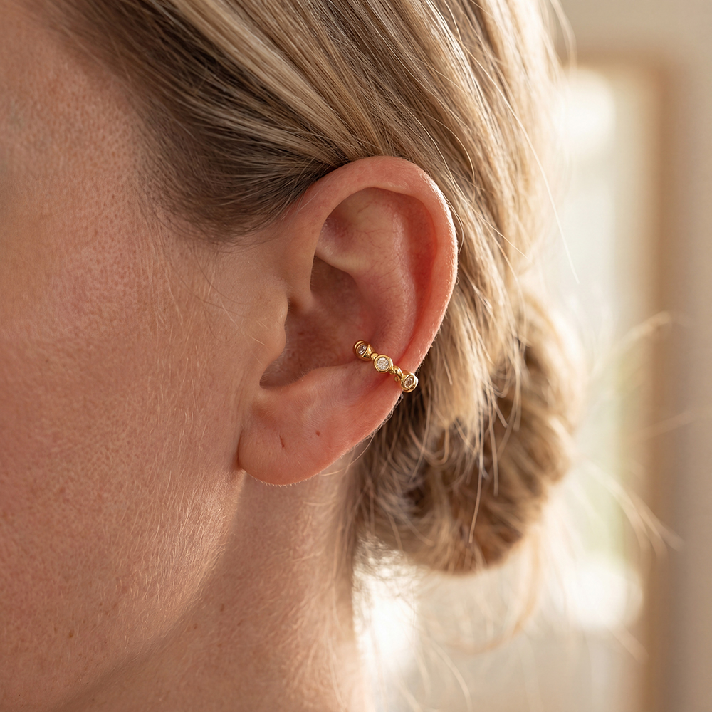 14mm cubic zirconia in a half-twisted setting Gold-plated ear cuffs 