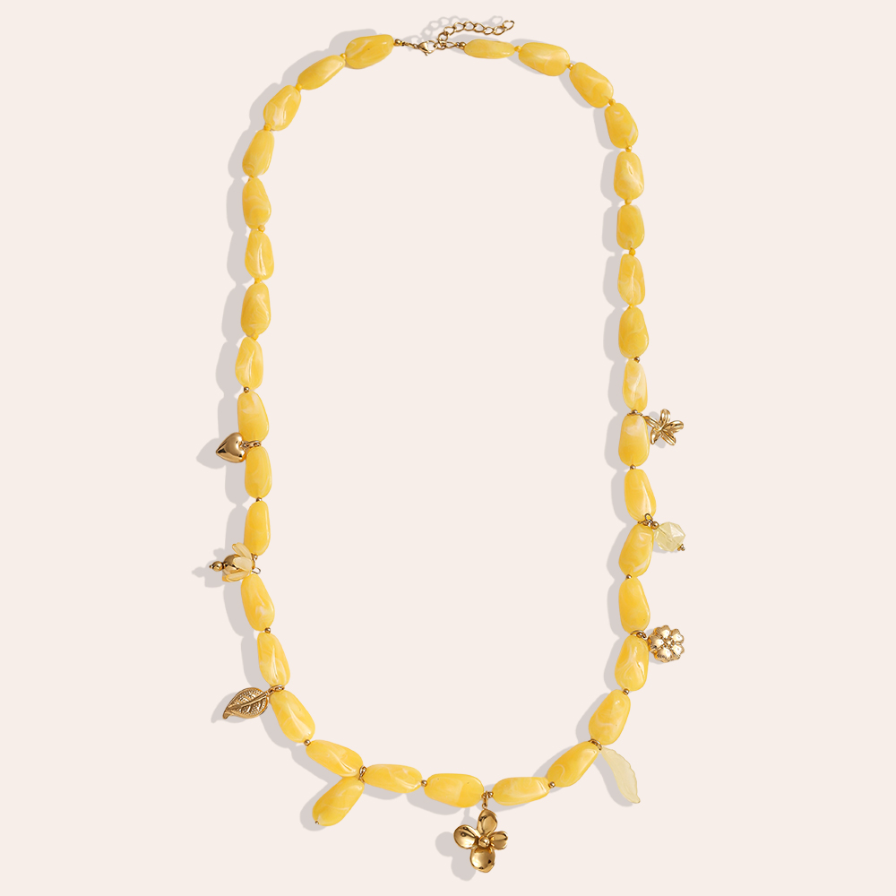 90cm elongated acrylic pieces and golden flower pendant stainless steel necklace      