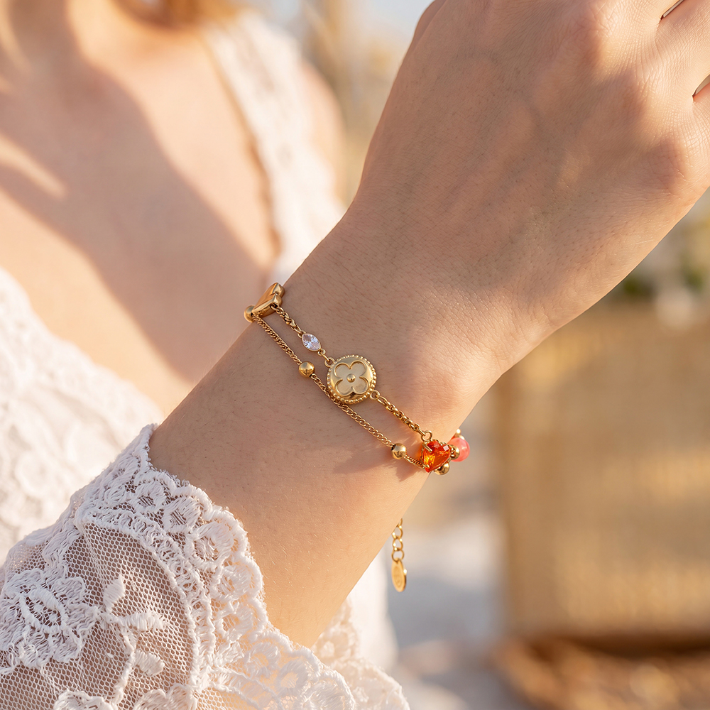 Stainless steel bracelet, 17 cm, with a heart and red crystal beads